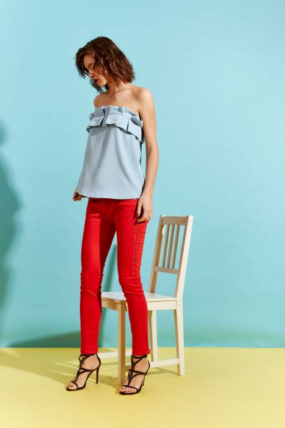 pantalón tachas rosso